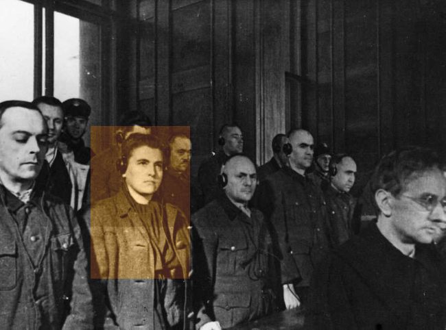 Photo from the process. Among the other accused – Maria Mandl. All stand in front of the benches.