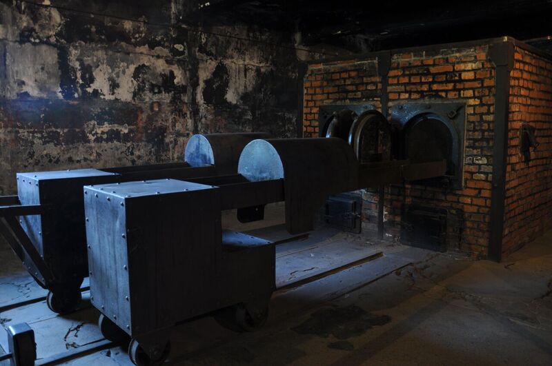 Brick furnaces with metal trolleys in the crematorium room.
