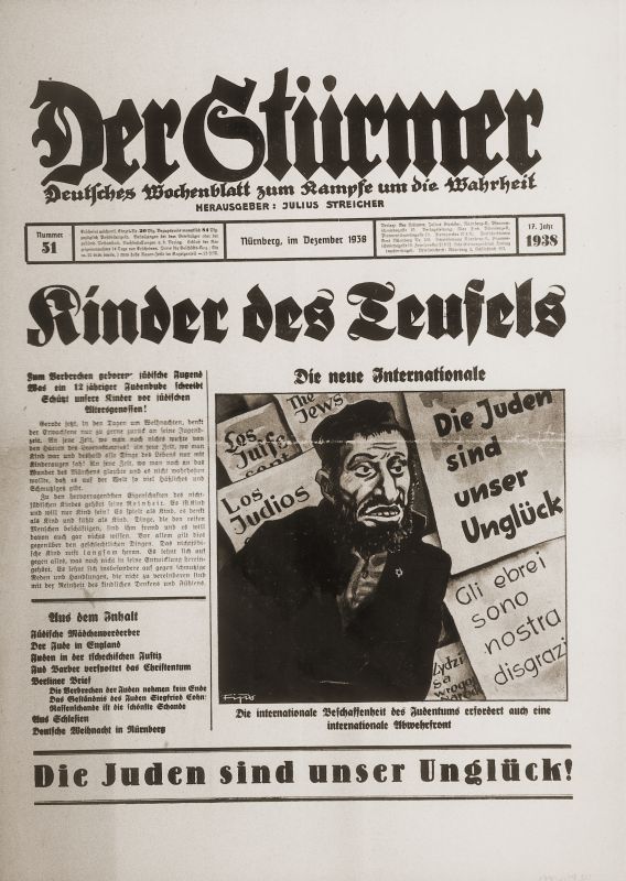 The front page of the anti-Semitic newspaper “Der Sturmer,” with a caricatured depiction of a Jew as a man in a cap, a coat and with an unfriendly face.
