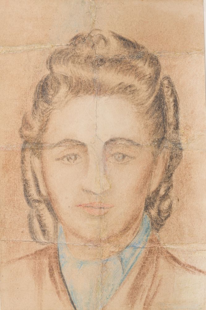 Crayon drawing. Young women. Long face, dark eyes, thin and slightly tightened lips. Loose, dark, hair slightly past the shoulders, part of it tied back. Serious, focused expression, face and eyes directed towards the recipient.