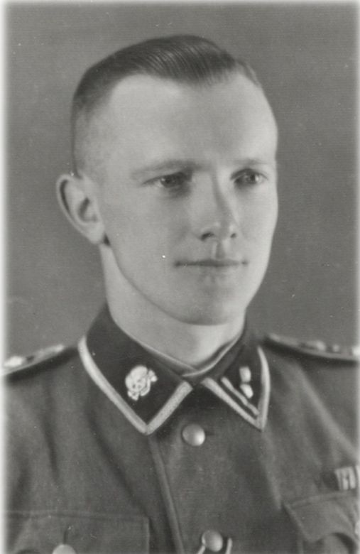 Portrait photograph of Gerhard Palitzsch dressed in SS uniform. Hair sleekly combed back. Gaze calm, directed to the side of the lens.