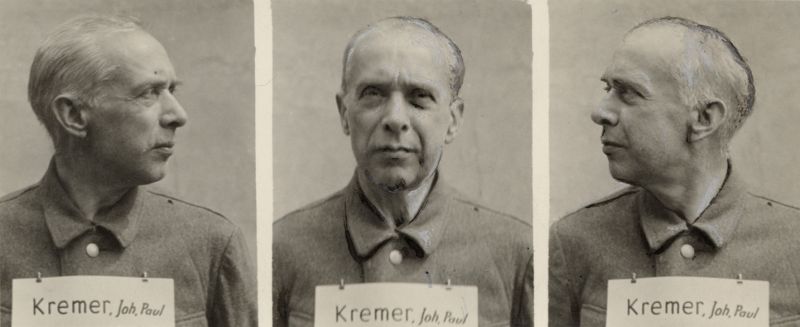 Johann Paul Kremer
Three trial photos of an elderly man: from the left profile, straight ahead and from the right profile. On the chest He has a piece of paper with the name written on it.