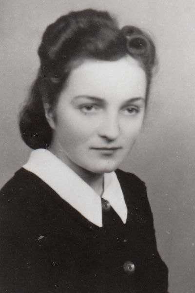 A photographic portrait of Zofia Stępień, dressed in a dark sweater with a white collar. Hair pinned back.